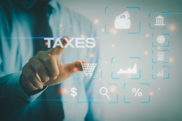 Tax payment  concept. Businessman touching tax  financial virtual button.payment by corporations such as VAT, income tax.